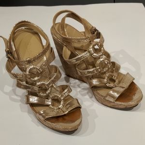 gold strap & rings gladiator wedge heel sandals buckle strap wraps behind ankle